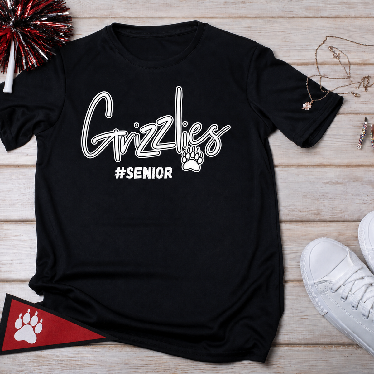 Black Grizzlies Senior shirt with red and black school-spirit accessories